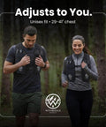 Two people jogging in forest wearing hydration running vest with 8 pockets and 17 oz flask for men and women reflective lightweight