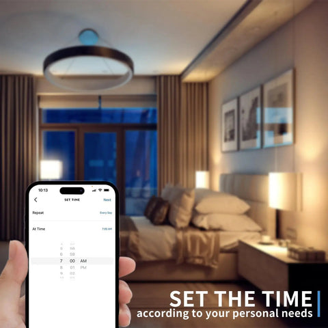 Bedroom lit with Go To Smart Plug Dimmer With Remote, phone showing brightness settings, Alexa ready digital light switch.