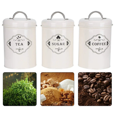 Boost Your Pantry Game With This Three Piece Airtight Kitchen Storage Jar Set Crafted From Thick Powder Coated Iron. Set of 3 jars labeled for tea, sugar, and coffee.