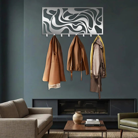 Sleek Abstract Wall Rack - Heavy Duty Modern Metal Hooks - Premium Key Holder And Coat Organizer - Three coats hanging on stylish wall decor.