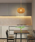 Plug In Pendant Light With Hand Woven Rattan Shade And Nifty Dimmer Switch Chill Boho Ceiling Lamp For Bedroom Or Living Room Includes Bulb Plus 15 Foot Hemp Rope Cord Vintage Paper Weave in modern kitchen setting.