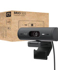 Legit Full HD 1080p Business Webcam With Auto Light Correction Smooth Remote Setup Certified For Virtual Meets on desk with packaging.