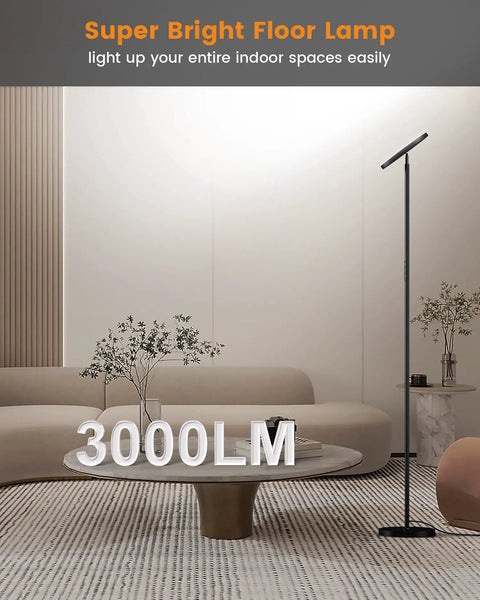 Lit 36W LED Floor Lamp With 3000LM Output in modern living room, tall black torchiere design next to sofa and coffee table.
