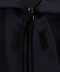Close-up of the zipper and hook-and-loop fasteners on the Heavy Duty Fire Retardant Work Suit With Aramid Insulation And High Visibility Design.