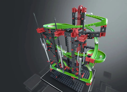 Dynamic M Set With 515 Parts For Four Buildable Models, Rotary Funnel, Sound Tubes, Cross Over, Five 90 Degree Curves, Steel Balls For Melodic Tones, Manual Chain Lift, A Solid STEM Toy Your Kids Will Totally Love displayed with green tracks and steel balls