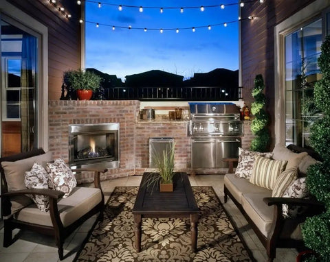 Outdoor patio setting with 25 Foot G40 Globe String Lights With 25 LED Bulbs For Indoor And Outdoor Use End To End Connectable above a seating area.