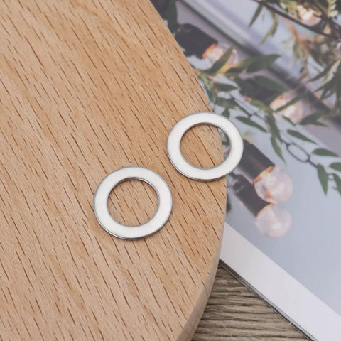 30Pcs Flat Washers 304 Stainless Steel 10x16x1mm Door Hinge Gaskets on wooden surface