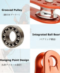 Close-up of a grooved pulley, integrated ball bearing, arc hanging point for the Zipline Pulley Beefy For Rescue, Climbing, Mountaineering And Hauling, Heavy Duty Aluminum Alloy, 30kN 6700 Lbs Capacity, Smooth Stainless Steel Bearings, Cable Kit Compatible, Black.