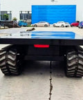Heavy Duty Self Propelled Machinery Moving Dolly With Remote Control For Industrial Equipment Transport, large with rugged wheels.