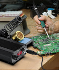 Pro 75W Soldering Station with Digital Display and T12 Tip in use for electronics repair on a circuit board