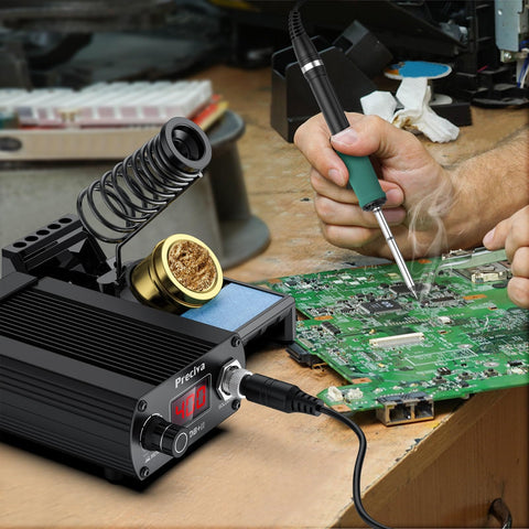 Pro 75W Soldering Station with Digital Display and T12 Tip in use for electronics repair on a circuit board