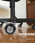 Office Chair Caster Wheel Zinc Alloy Swivel Wheel with Brake, 4pcs close-up on black locking wheel under a desk.