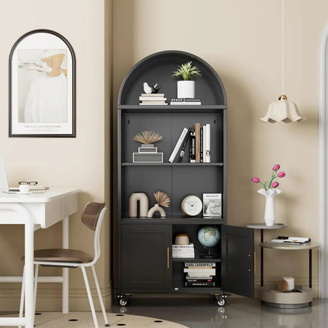 72 Inch Metal Arched Bookcase With Doors And Wheels, Industrial Black, Tall Storage Cabinet in living room setting with decor items.