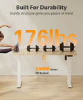 Electric Height Adjustable Standing Desk 48x24 Inches With White Frame And Maple Top testing 176 lbs weight capacity