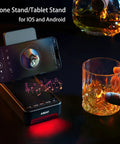 Phone Stand With Bluetooth Speaker And LED Color Changing Light Dope Wireless Speaker Dock shown with colored lighting