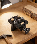 3 In 1 Woodworking Drill Locator And Self Centering Doweling Jig For Cabinet And Furniture Assembly on a workbench