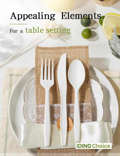 100% Compostable Heavy Duty Flatware Set, 200 Count displayed on elegant table setting with napkin