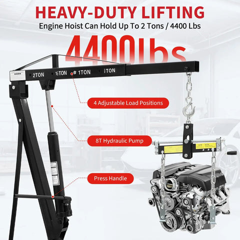 Bad Boy Heavy Duty Folding Hydraulic Engine Hoist And Cherry Picker holds 4400 lbs with adjustable boom and hydraulic pump.