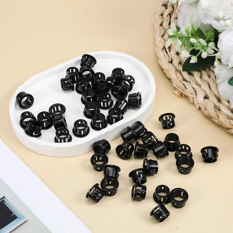 50 Pack Black Snap Bushing for Half Inch Knockouts displayed on a tray, snap in plastic cable grommets for electrical wiring