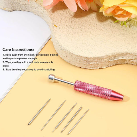 Six Piece Piercing Kit With Ball Grabber Tool And 16G 18G Stainless Steel Tapers Flat Back Insertion Tools displayed on table