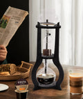 Kick Back And Sip Smooth Chills With This Sharp Cold Brew Drip Coffee Maker Crafted From A Borosilicate Pitcher And Real Wood Stand For Hassle Free Iced Coffee Runs That Come Out Fresh And Totally On Point Daily, featuring 600ml glass pitcher and timber frame.