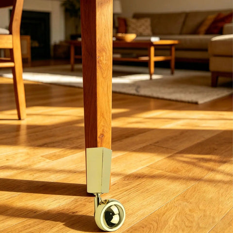 Close-up of furniture leg with Two-Pack Metal Swivel Cup Casters, Square Cup Style Furniture Wheels for tables, 2.48 inch diameter.