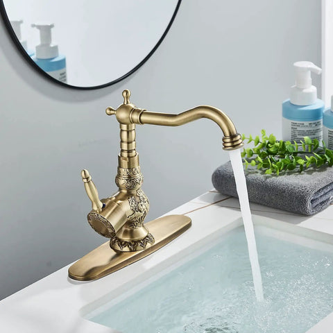 Antique Brass Swivel Spout Bathroom Faucet With Single Lever Mixer Tap Vanity Sink Faucet With Pop Up Drain And Overflow Easy Install On Three Hole Sinks Sleek Modern Vintage Style mounted on a bathroom sink
