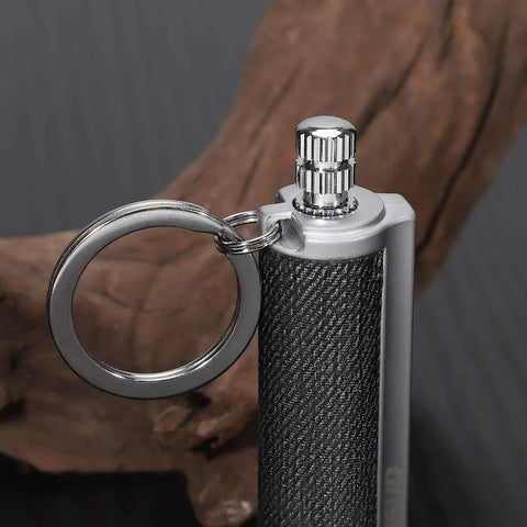 Close-up of stainless steel 2 Pack Permanent Infinity Match Lighters With Multitool Keychains Reusable Waterproof Strike Anywhere Flint Fire Starters For Outdoor Survival EDC Gear For Men Fuel Not Included