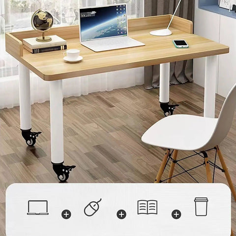 Heavy Duty Metal Furniture Legs Four Pack With Thick Steel Base And Rubber Swivel Casters Built Tough For Quick DIY Projects on a desk.