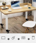 Four Pack Heavy Duty Metal Furniture Legs With Swivel Casters Thickened Steel Table Base supporting a wooden desk with a laptop.