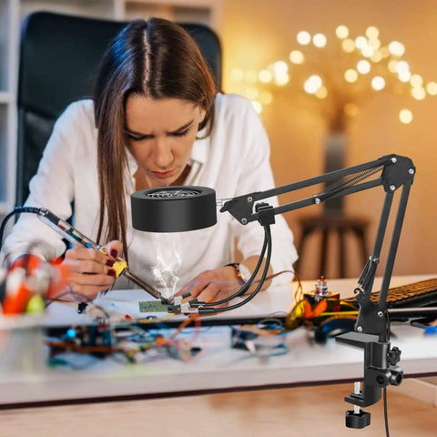Woman using 3 In 1 Solder Fume Extractor Smoke Absorber Fan Lamp With 2 Helping Hands And 3 Carbon Filters for DIY project