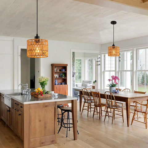 Total Vibe Hand Woven Rattan Pendant Light illuminating a kitchen island with a stylish boho design and natural wood elements.