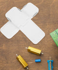 2 Pack Childproof Drawer Locks For Cabinets And Drawers Universal Fit ABS Self Adhesive Safety Latches on wooden surface