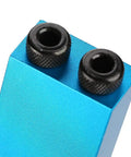 Close-up of blue Pocket Hole Jig Kit For Woodworking With 15 Degree Oblique Hole Locator showing steel bushings in aluminum body.