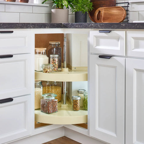 Two-Tier Pie-Cut Lazy Susan Organizer for Base Corner Kitchen Cabinets with Almond Plastic Shelves filled with jars