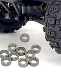 10 Piece Metal RC Car Bearing Kit With Sealed Ball Bearings For Trucks shown near RC car wheel