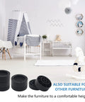 Rock Solid Furniture Risers Set Of Four Black Bed Lifts With Tough Heavy Duty Build Holds Up To Three Thousand Pounds in a nursery setting.