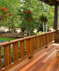 Dang Tough Deck String Light Poles Four Pack Heavy Duty All Metal Hooks For Fences And Wood Railings Easy Grip Adjustable Clamp holding star lanterns on a wooden deck railing.