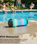 20W Portable Bluetooth Speaker with crankin loud stereo sound and LED lights, IPX4 waterproof by the poolside, ideal for outdoor use.
