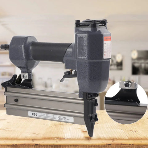 Rock Solid Heavy Duty Pneumatic Brad Nailer And Air Powered Stapler For No Fuss Woodworking and DIY Carpentry Projects Featuring Premium Aluminum Alloy Construction, close-up of tool on wood