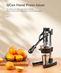 Heavy Duty Cast Iron Manual Citrus Juicer Press, Giant Orange Squeezer with fresh oranges and juice on kitchen counter.