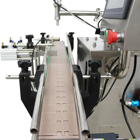 Automatic Servo Filling Machine For Pastes And Liquids Features Plug N Play Setup And No Sweat Operation Delivers Rock Solid Precision For Honey Jam Peanut Butter Sauces 100 To 1000 Ml Range close-up of filling machine conveyor system with precision controls.