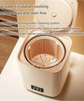 Hassle Free 7L Portable Washer Dryer, Compact Tabletop Mini Spin Cycle Laundry Game Changer showing inner basket design for circulation washing.