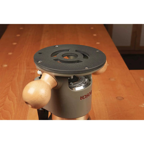 Heavy Duty CNC Milled Acetal Resin Router Baseplate Designed For Bosch 1617 Fixed Base Workshop Rigs featuring wood handles and mounting area.