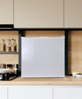 Hella Solid Upright Freezer One Point Two Cubic Feet White Compact Frost Vault With Wire Rack Garage Ready Meat Storage Box in modern kitchen.