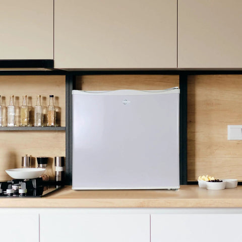Hella Solid Upright Freezer One Point Two Cubic Feet White Compact Frost Vault With Wire Rack Garage Ready Meat Storage Box in modern kitchen.