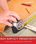 Heavy Duty Retractable Imperial Pocket Tape Measure with Nylon Coating used on wood surface for measuring, focus on tape and hook.