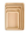 Set of stacked nonstick aluminum half sheet pans, various sizes, including 13 by 18 inches with reinforced steel rim for baking, hand wash only.
