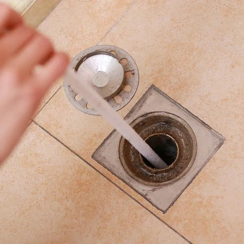 Using Sink Drain Overflow Cleaning Brush 17.7 Inch Long Flexible Hair Catcher For Stubborn Clogs on floor drain