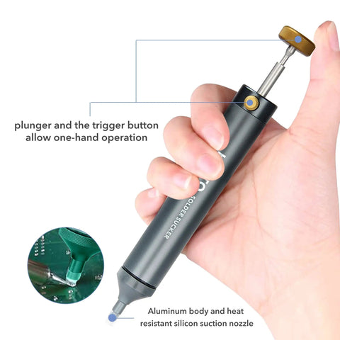 Hand holding One Hand Trigger Desoldering Vacuum Pump Solder Sucker with aluminum body and silicone tip for quick solder removal.